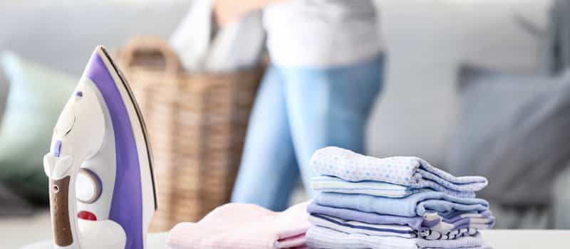 NDIS Support Worker doing Laundry